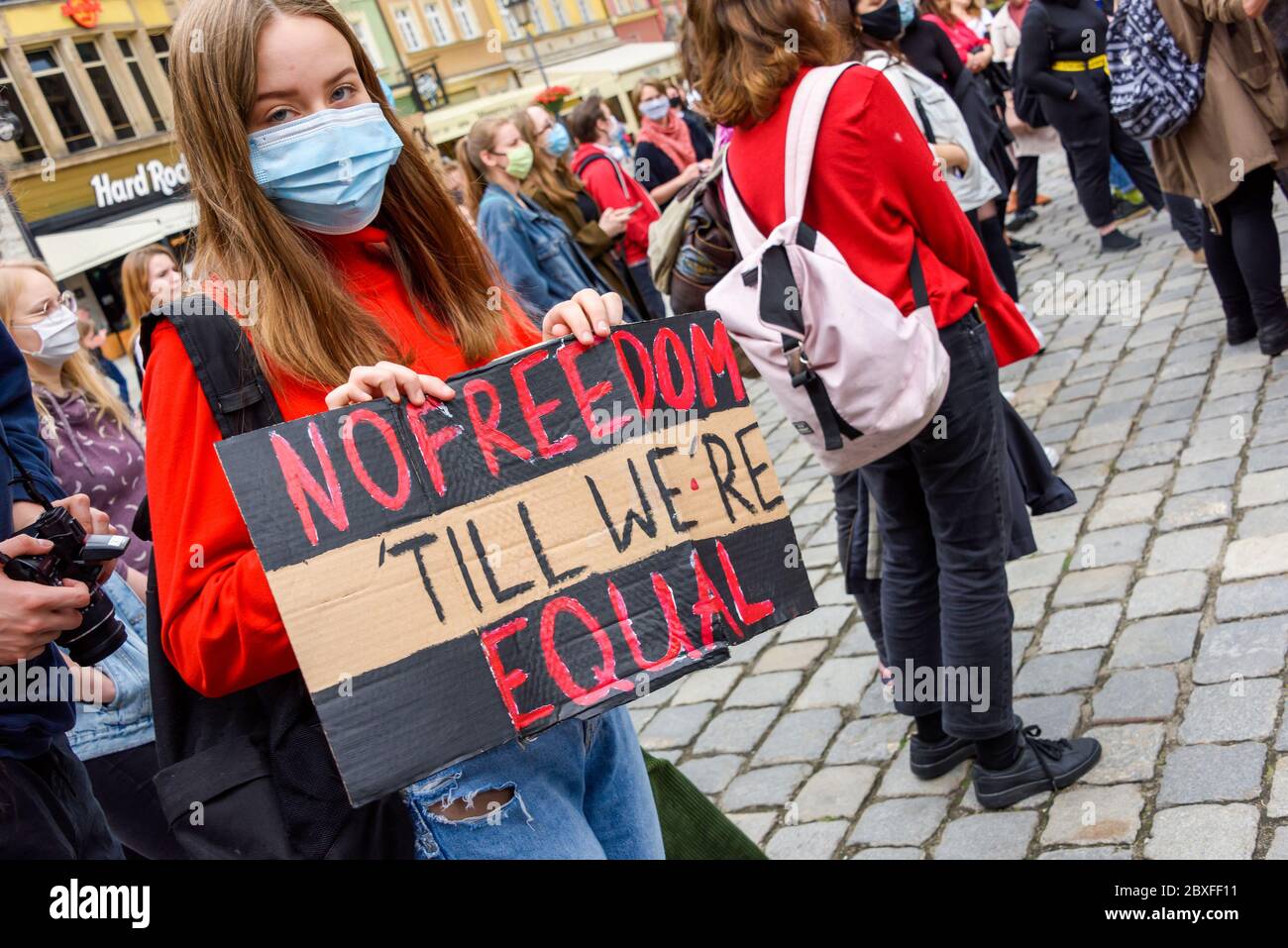 Wroclaw, Poland, 06.06.2020 - Young people hold a poster with words "no freedom till we`re equal" on polish peaceful protest against racism and hatred Stock Photo